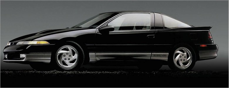 Photographie d’un coupé Eagle Talon noir utilisée comme référence